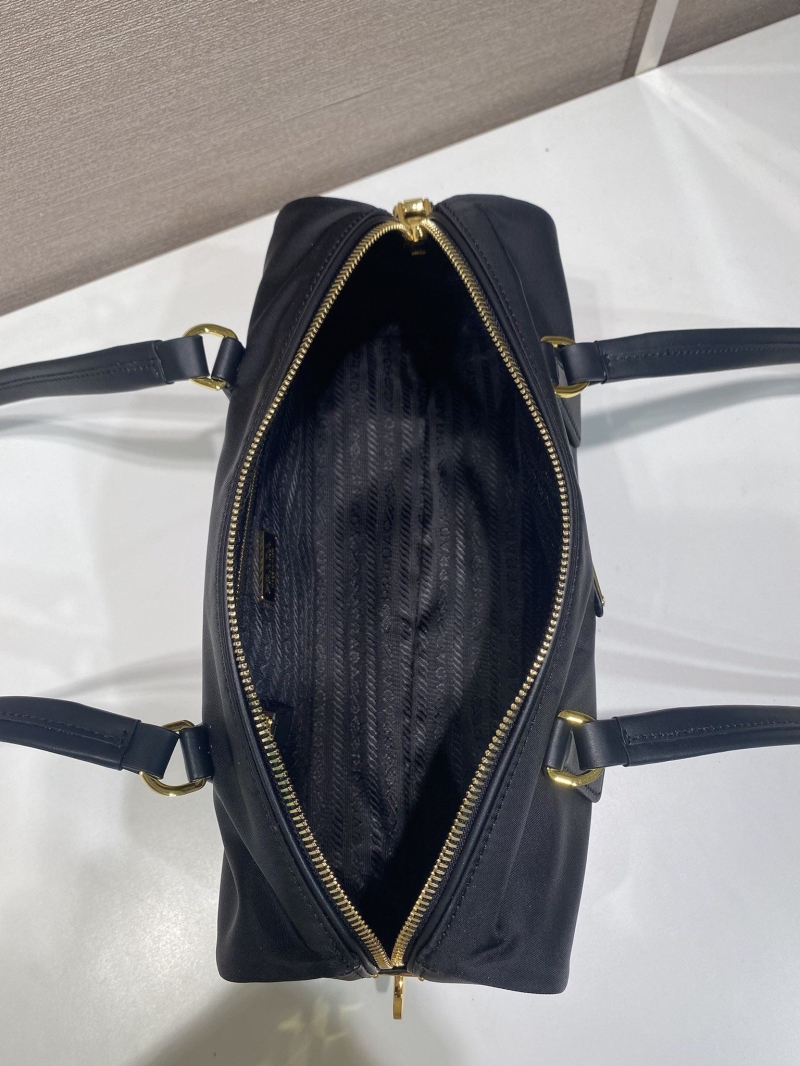 Pra*a top handle bags